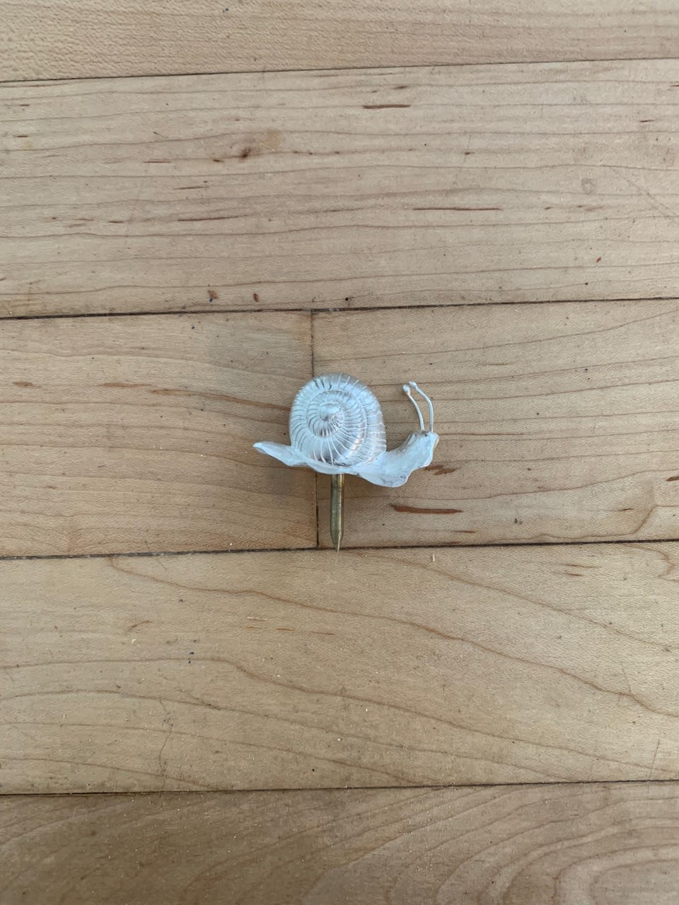 Miles Lawton Gracey, silver snail nail 1, 2025