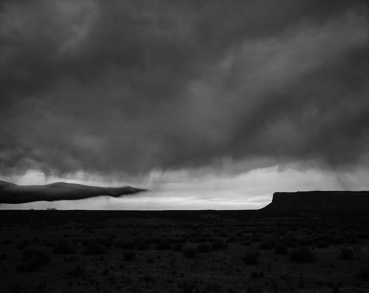 Arno Rafael Minkkinen, Muley Point, Arizona, USA (thunder storm and arm), 1999