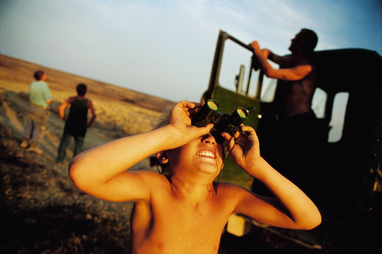 Jonas Bendiksen, Kazakhstan, Boy with binoculars, 2000