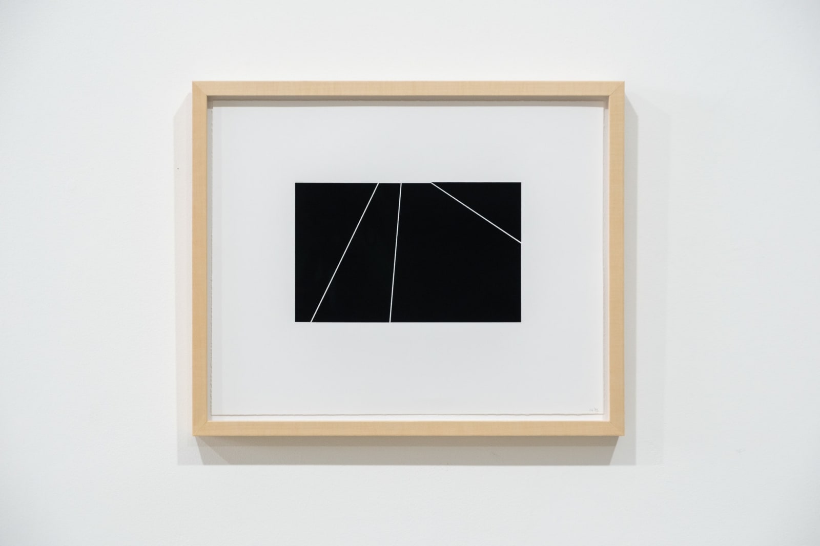 A framed black and white abstract screen print by Ian Gouldstone. A black rectangle is divided into multiple sections by thin white lines.