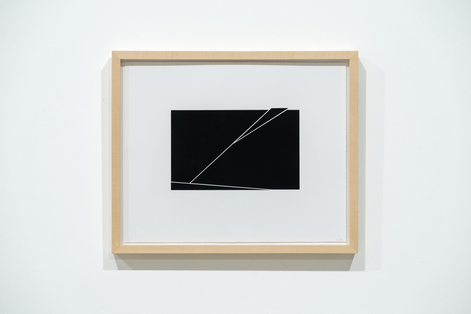 A framed black and white abstract screen print by Ian Gouldstone. A black rectangle is divided into multiple sections by thin white lines.