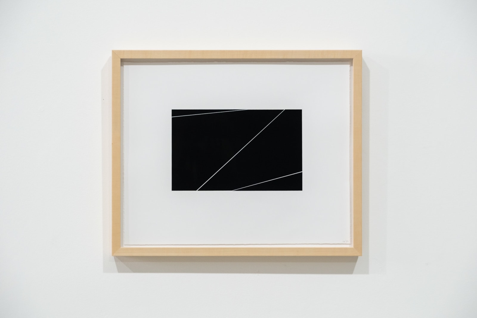 A framed black and white abstract screen print by Ian Gouldstone. A black rectangle is divided into multiple sections by thin white lines.