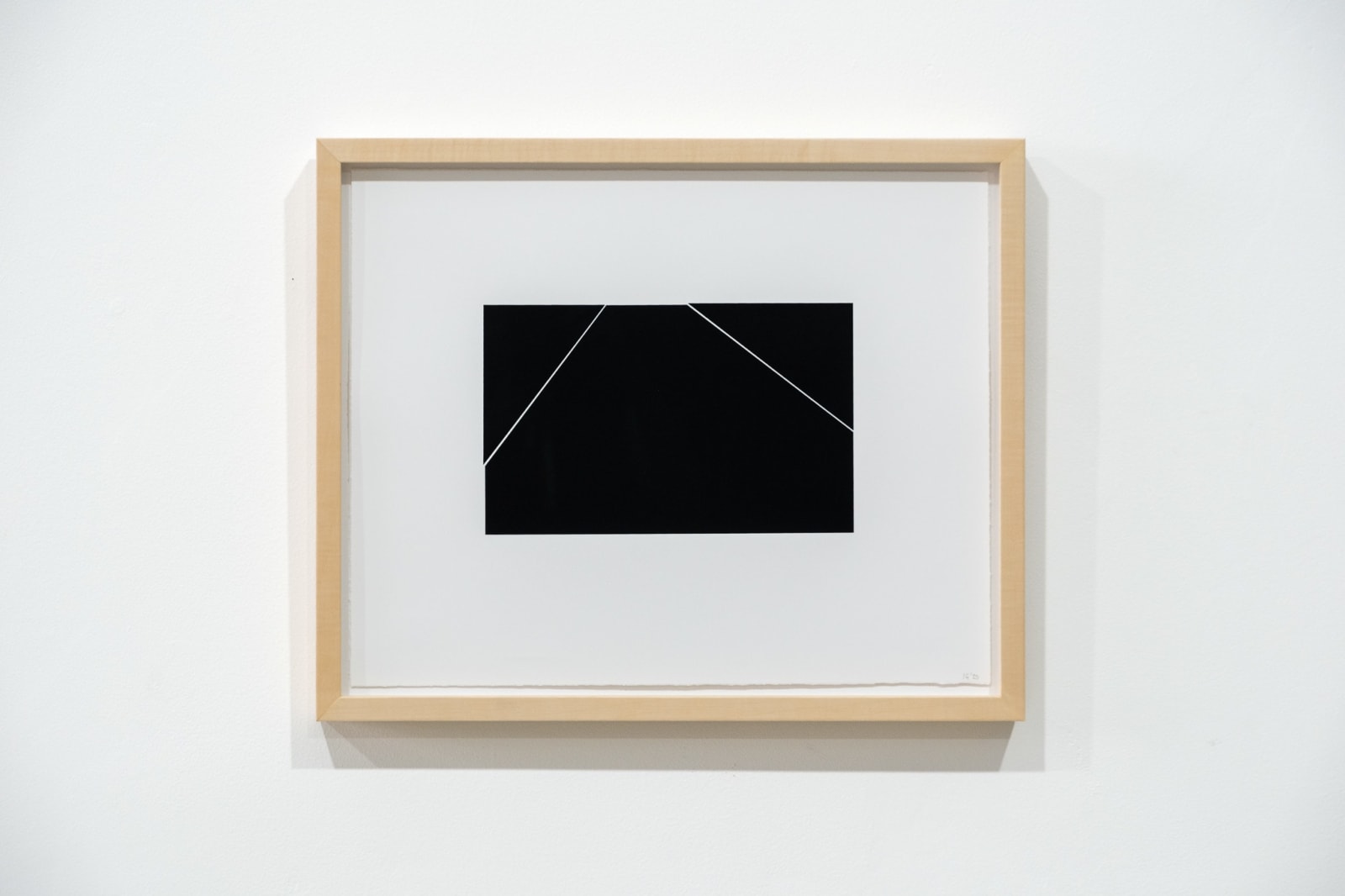 A framed black and white abstract screen print by Ian Gouldstone. A black rectangle is divided into multiple sections by thin white lines.
