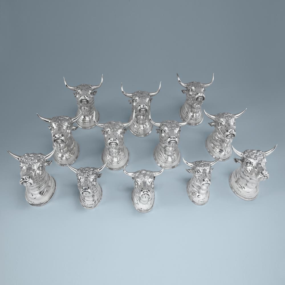 Hunt & Roskell, A Unique Set of Twelve Antique English Silver Stirrup Cups in the Forms of Bulls Heads, 1869 & 1893