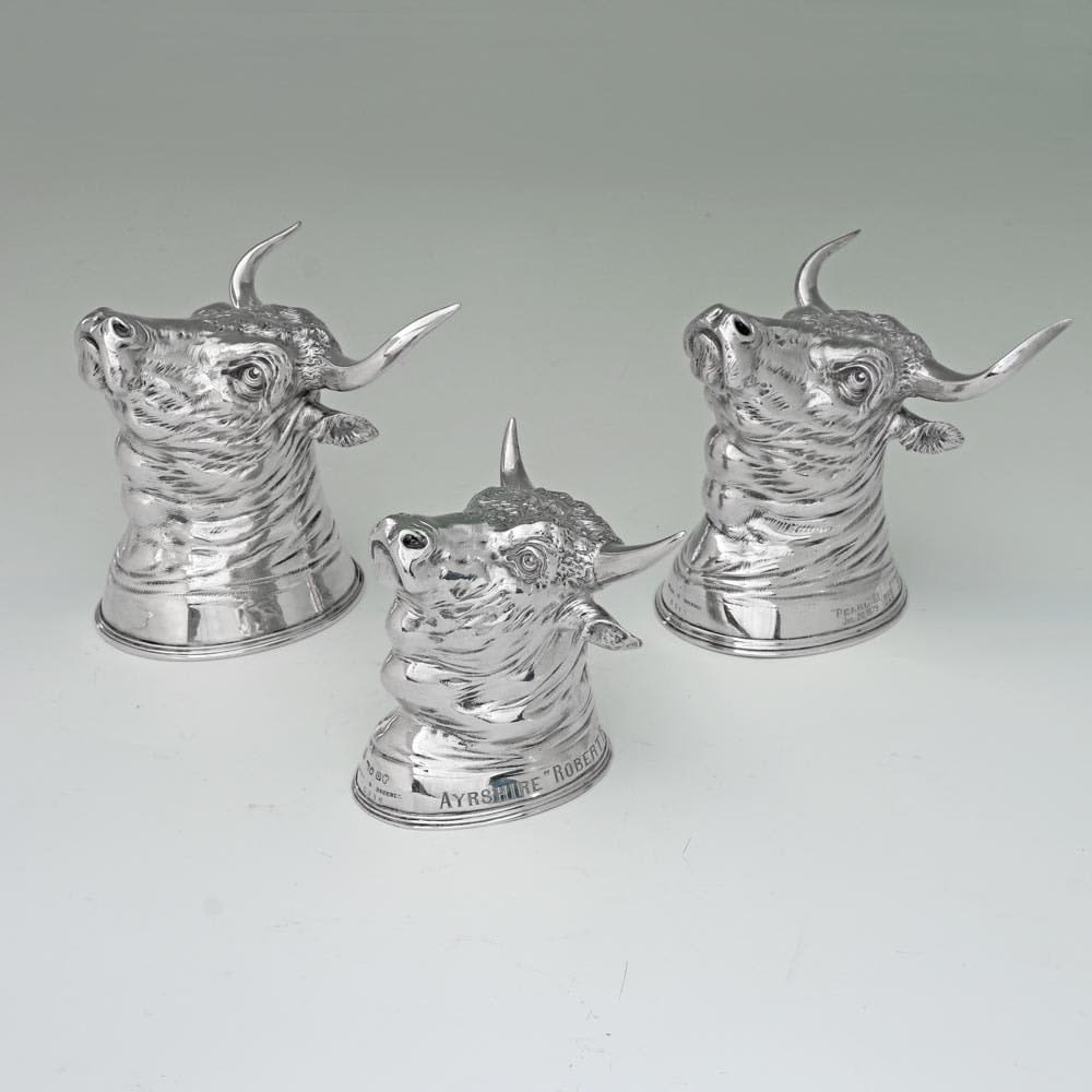 Hunt & Roskell, A Unique Set of Twelve Antique English Silver Stirrup Cups in the Forms of Bulls Heads, 1869 & 1893