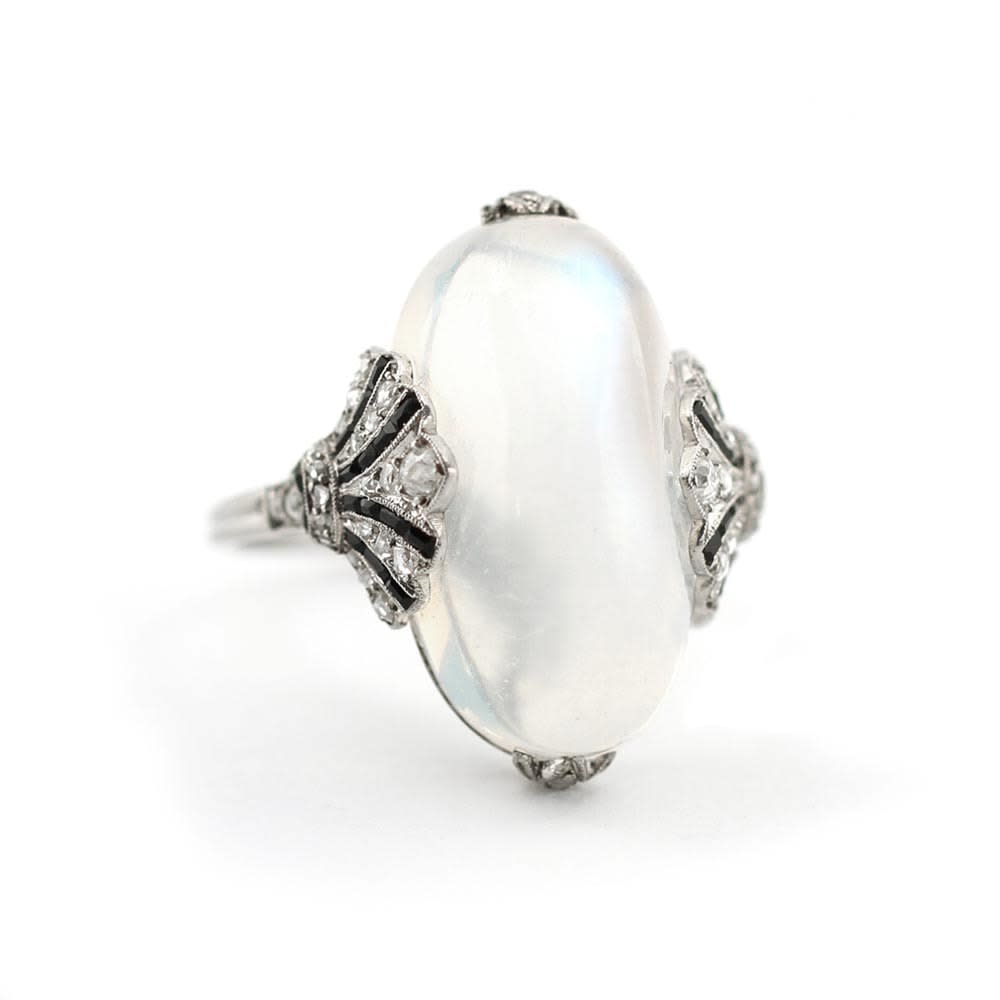 An Art Deco French Moonstone, Diamond and Onyx Ring, c. 1920