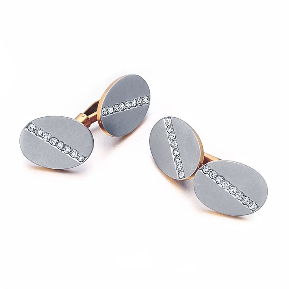 A Pair of Art Deco Platinum, Gold & Diamond Cufflinks, c. 1920