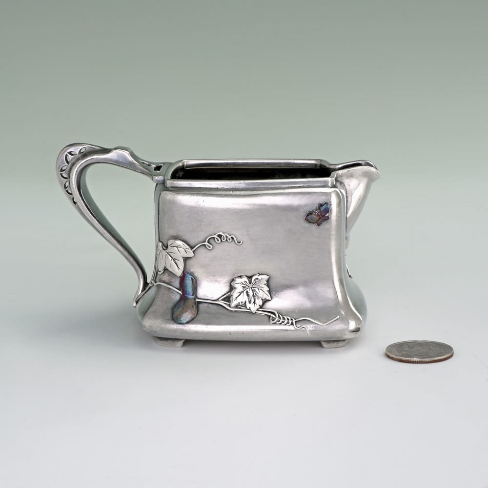 Tiffany & Co., A Small American Silver and Mixed Metal Creamer, c. 1878