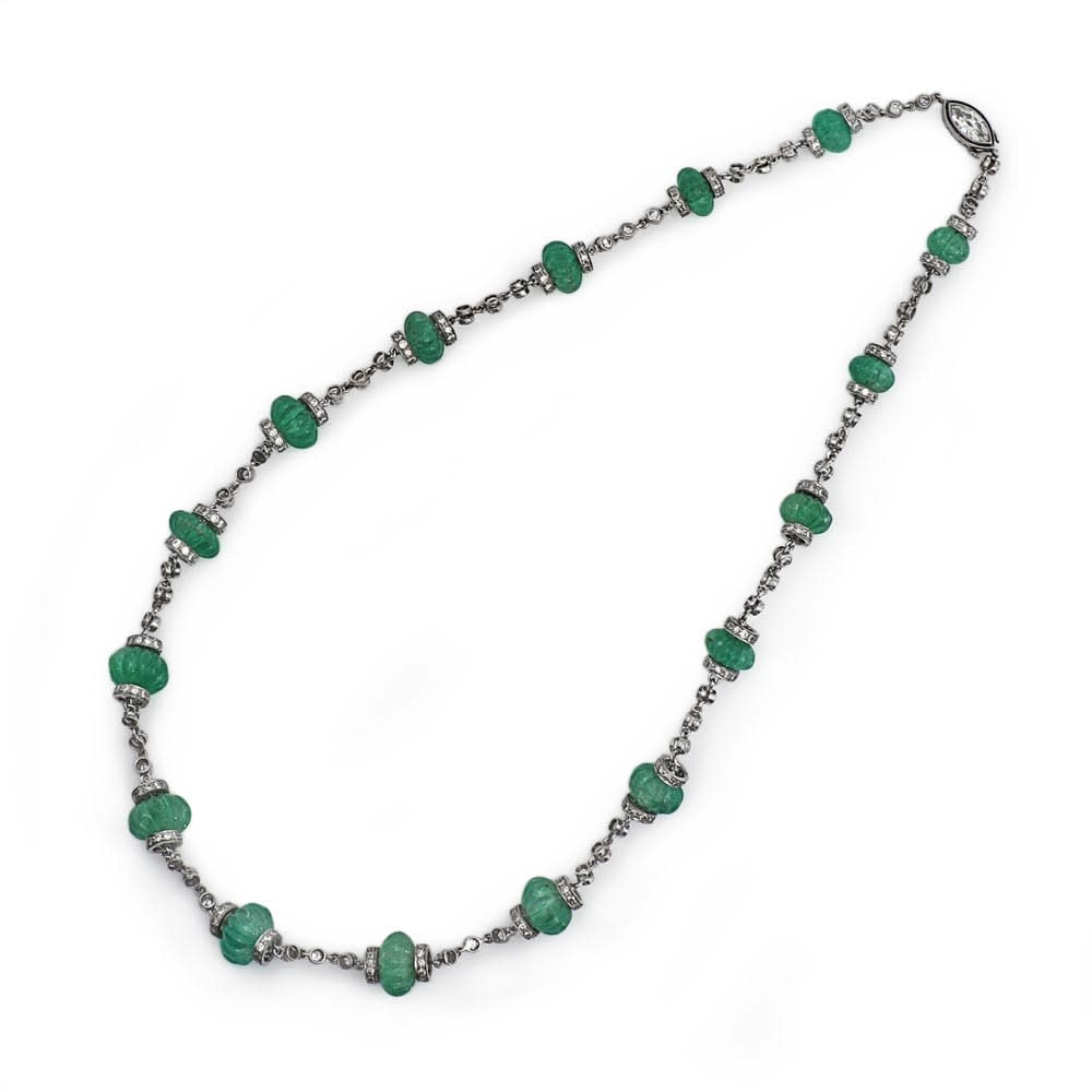 A Platinum, Carved Emerald Bead and Diamond Chain Necklace, c. 1920