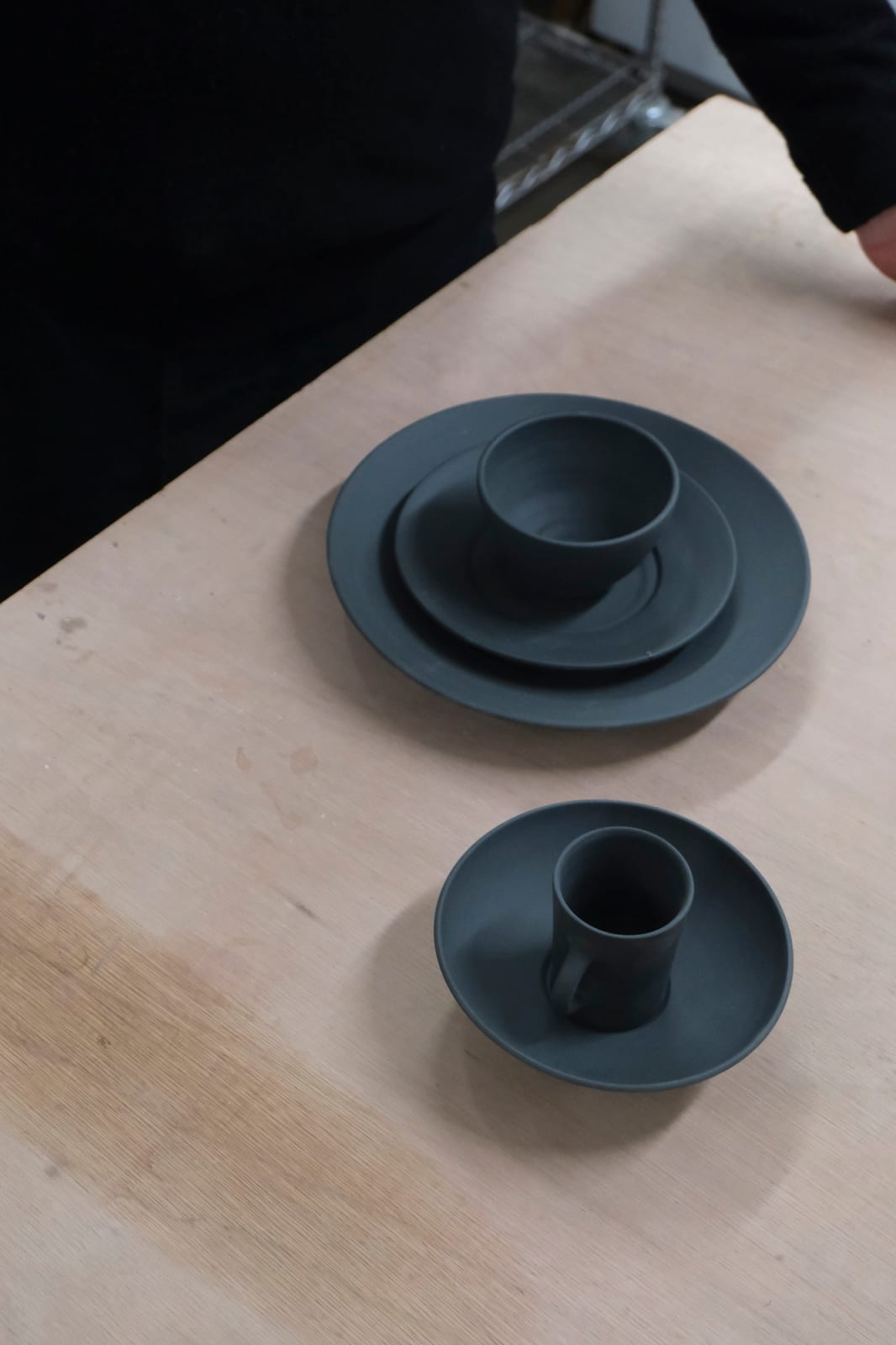 Julian Stair, Black Porcelain Place Setting, 2025