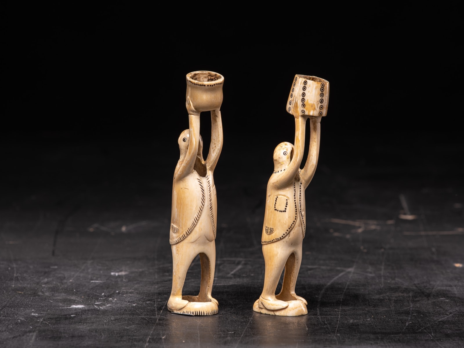 Pair of Inuit Male Statues carved in Caribou bone-probably Nunivak., 20th Century