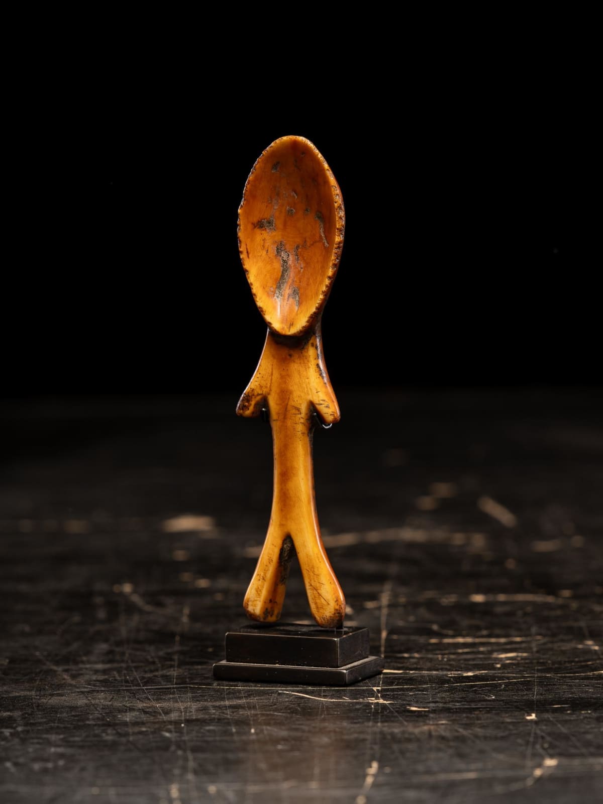 Lega ceremonial Spoon representing human abstract figure, 1st half 20th C