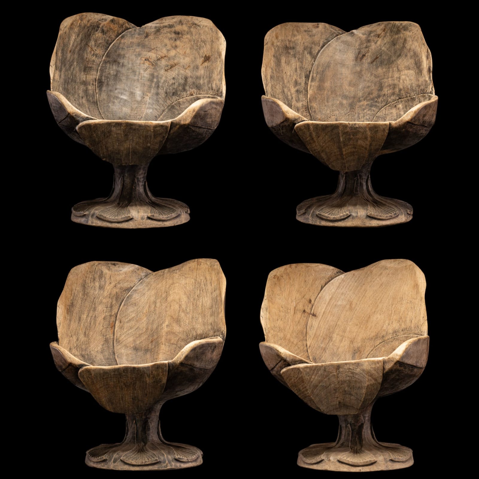 Set of 4 hardwood chairs hand-carved out of one solid block in the form of a stylized flower-form.,
