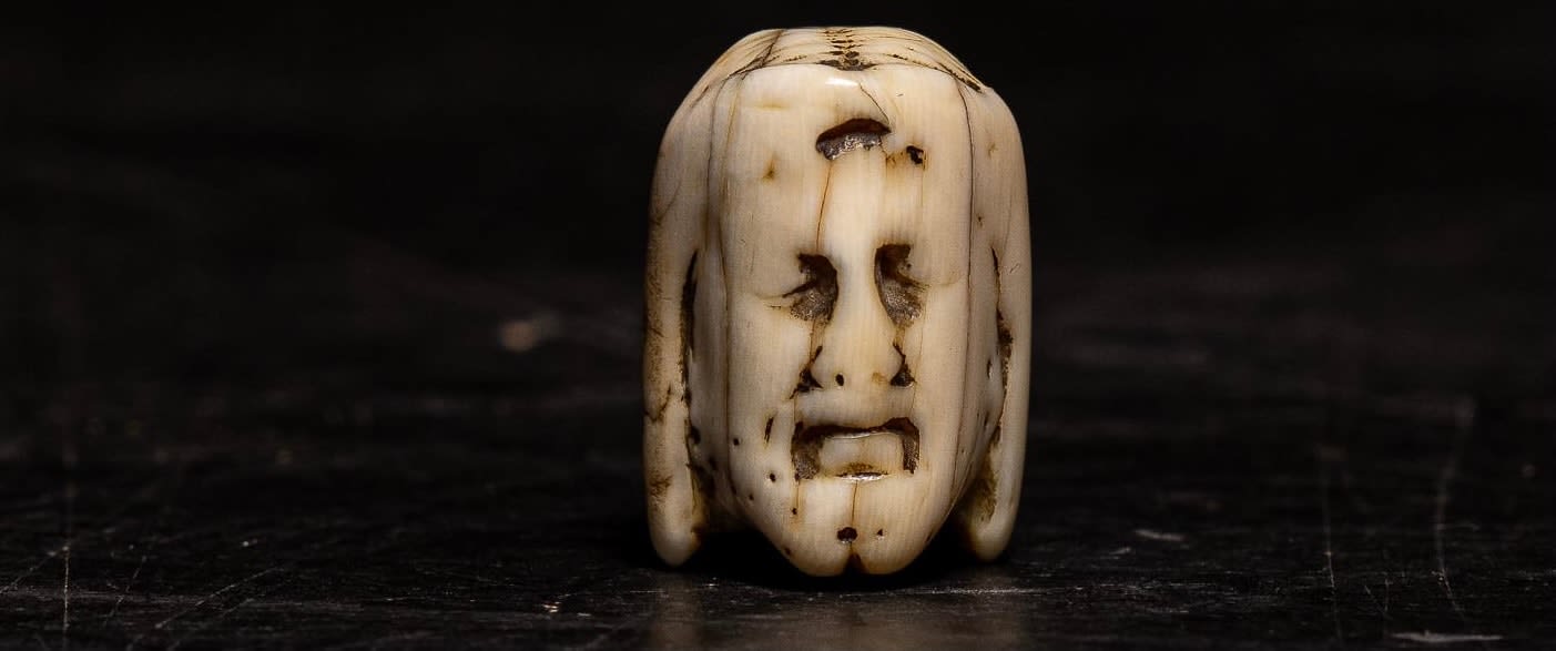 A Flemish Carved Ivory Janus faced Memento Mori Vanitas Paternoster Rosary Bead, Belgium, 17th Century