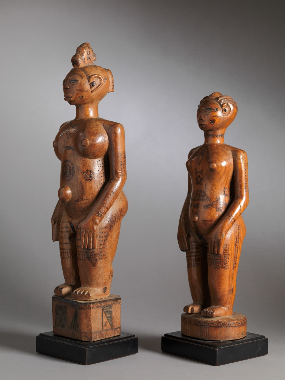 Zela People, DRC. Two Wooden Ancestors Sculptures with Scarifications., 1st half 20th Century