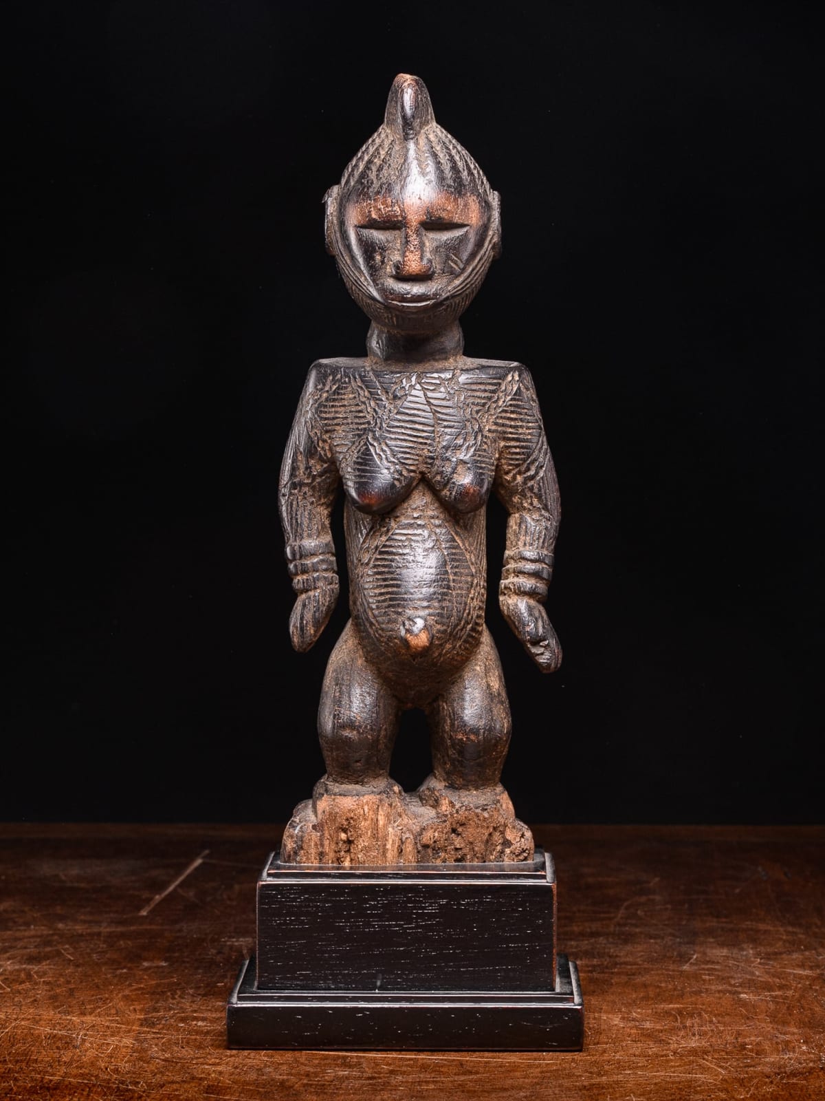 Igala scarified Maternity with infant on her back, Nigeria, 1st half 20th Century