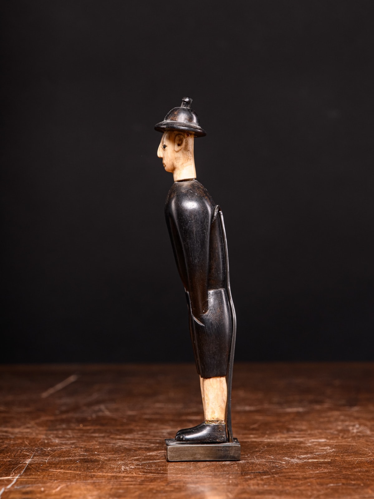 Kongo Ebony wood statue depicting Chinese worker waring Ivory hat,DRC., first half 20th C