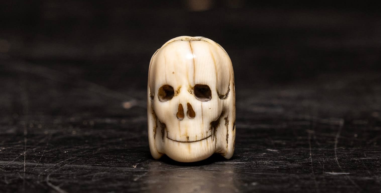 A Flemish Carved Ivory Janus faced Memento Mori Vanitas Paternoster Rosary Bead, Belgium, 17th Century