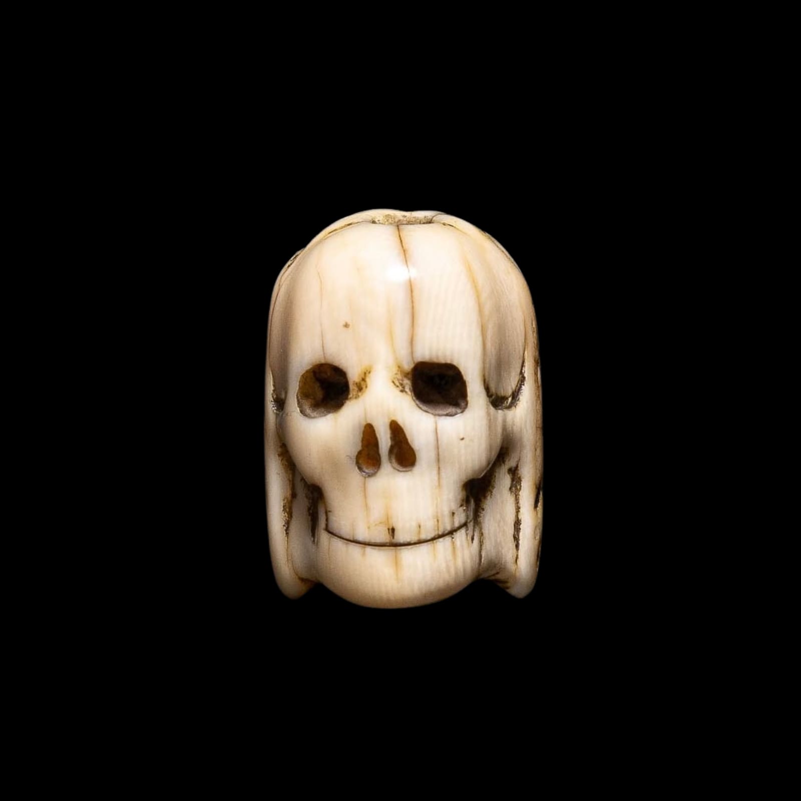 A Flemish Carved Ivory Janus faced Memento Mori Vanitas Paternoster Rosary Bead, Belgium, 17th Century