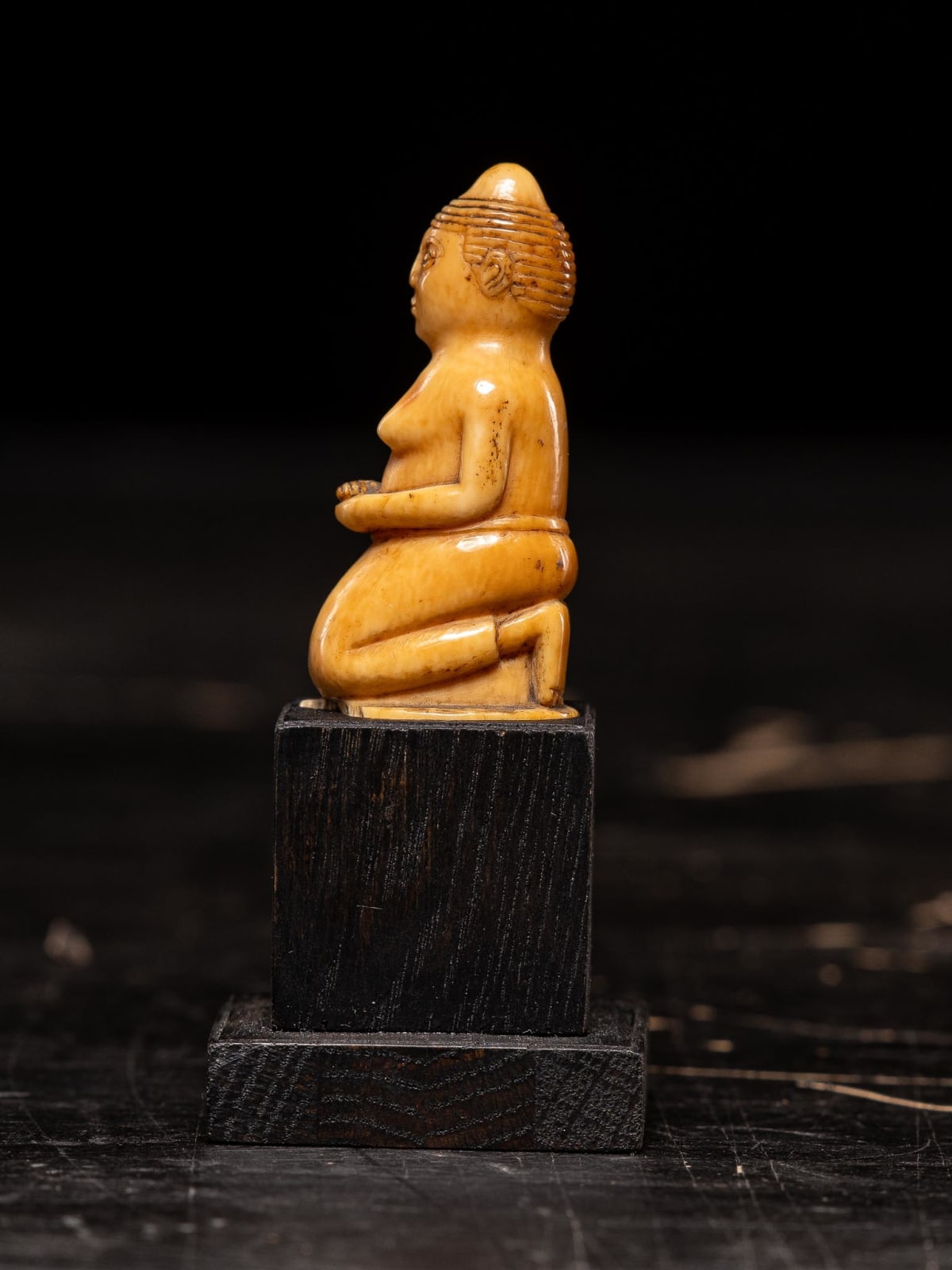 Female kneeled figure carved by the Kongo people of the Loango Region, DRC, 19-20th Century