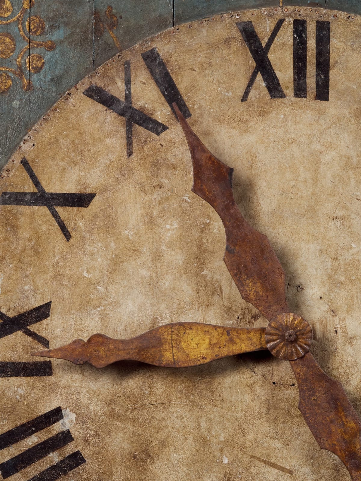 Early 19th C Clock on a Polychromed panel with leftover of the mechanism in the back.Gilded hands fixed on a tin sheet., first half 20th C