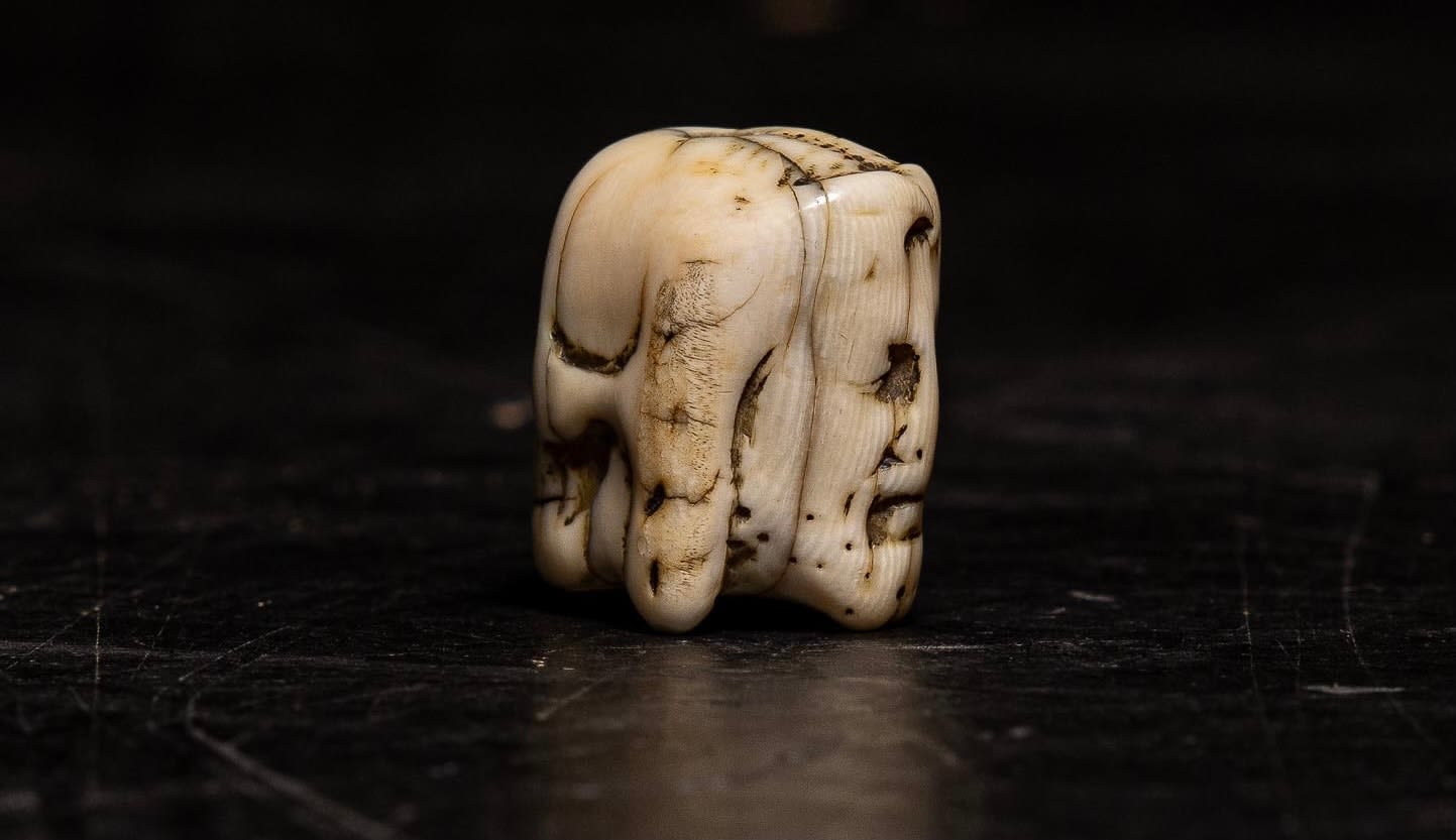 A Flemish Carved Ivory Janus faced Memento Mori Vanitas Paternoster Rosary Bead, Belgium, 17th Century