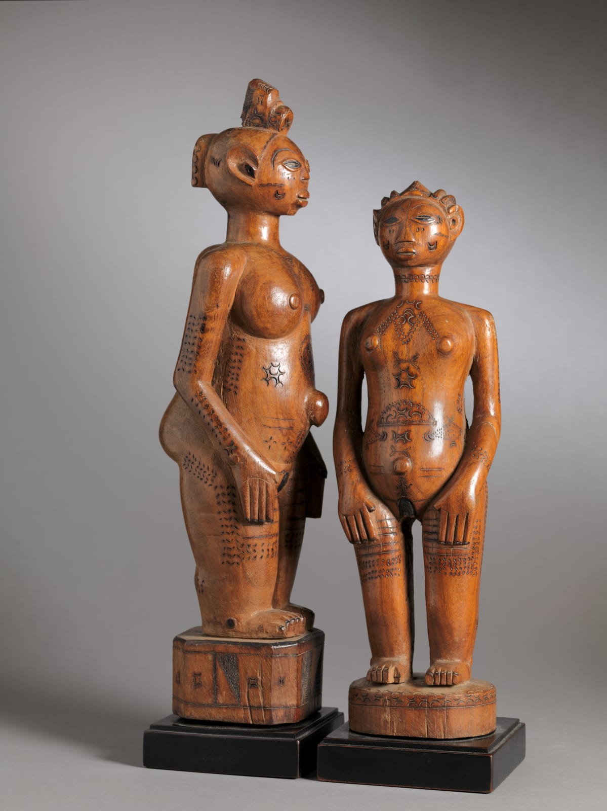 Zela People, DRC. Two Wooden Ancestors Sculptures with Scarifications., 1st half 20th Century