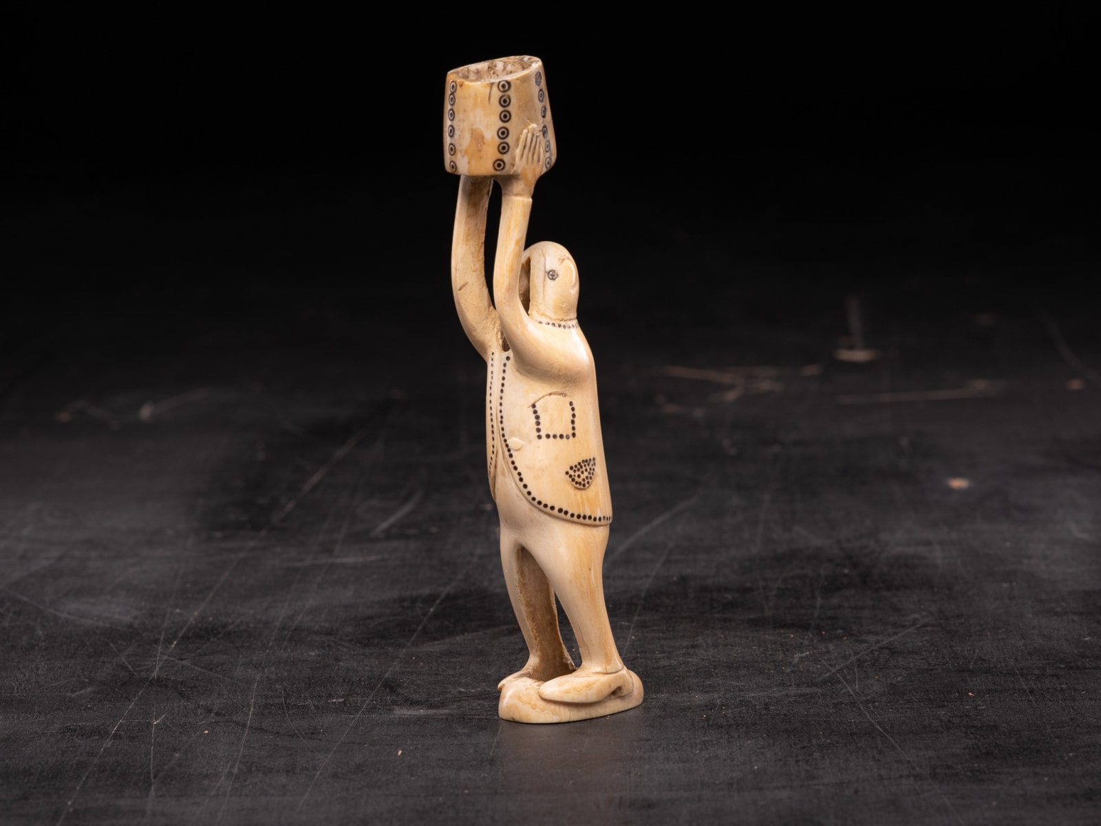 Pair of Inuit Male Statues carved in Caribou bone-probably Nunivak., 20th Century