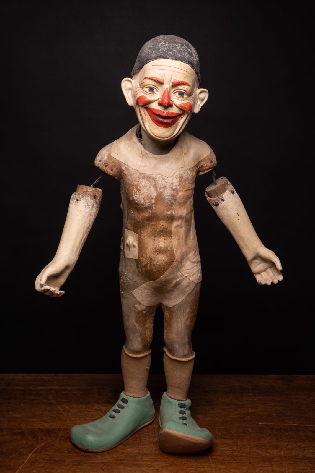 Antique Circus Clown with poseable arms and caracterful mysterious smile., 1st half 20th Century