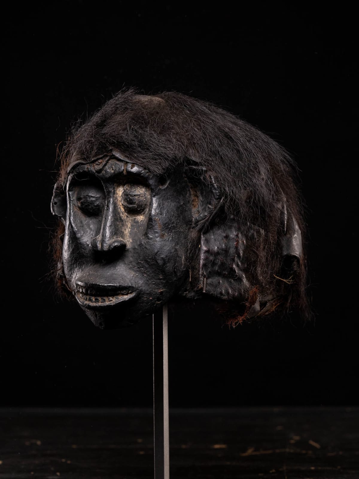 Skincovered Monkey Mask with indignious repair, Wum People, Cameroon., 20th C