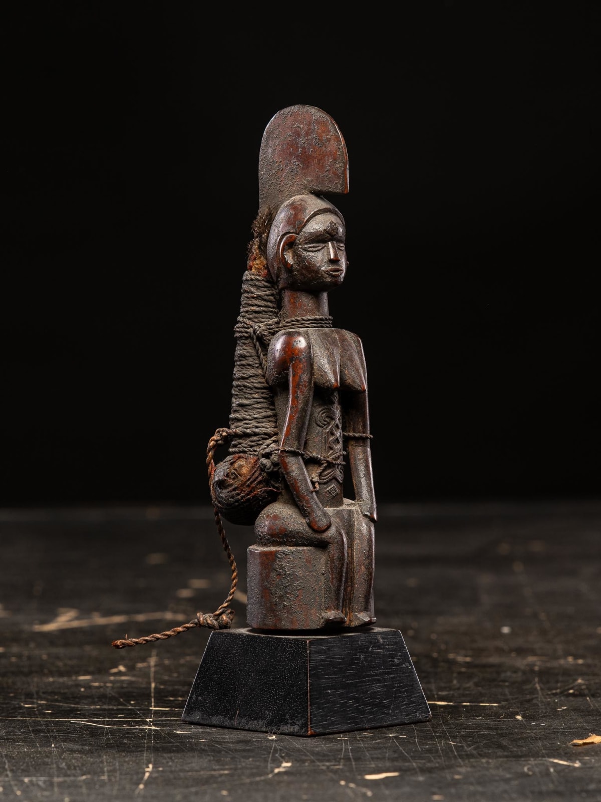 Bembe seated Female Power Figure with charge on her back.Bembe People, DRC., 1st half 20th Century or earlier