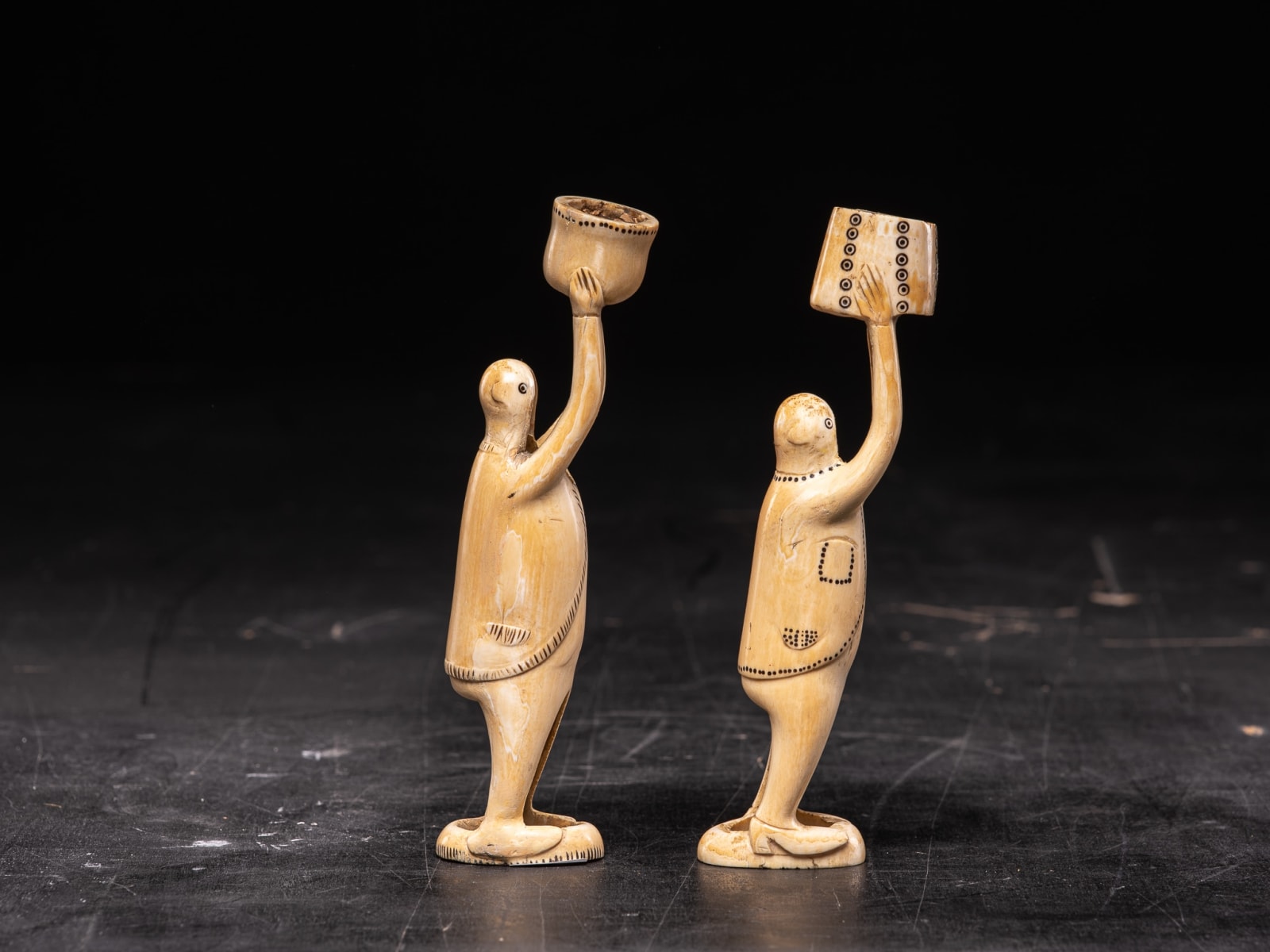 Pair of Inuit Male Statues carved in Caribou bone-probably Nunivak., 20th Century