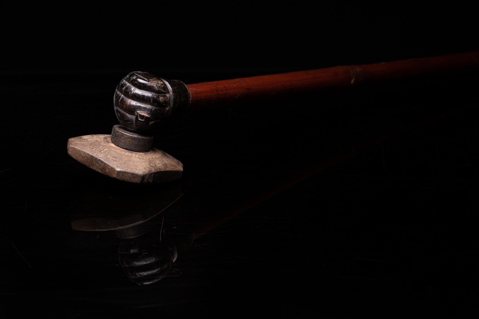 Large Antique Chinese Opium Pipe in Bamboo, Horn and Jade. The Long Stem ends in a Clenched Hand, holding a Grey Ceramic Pipe-Bowl., 19th Century
