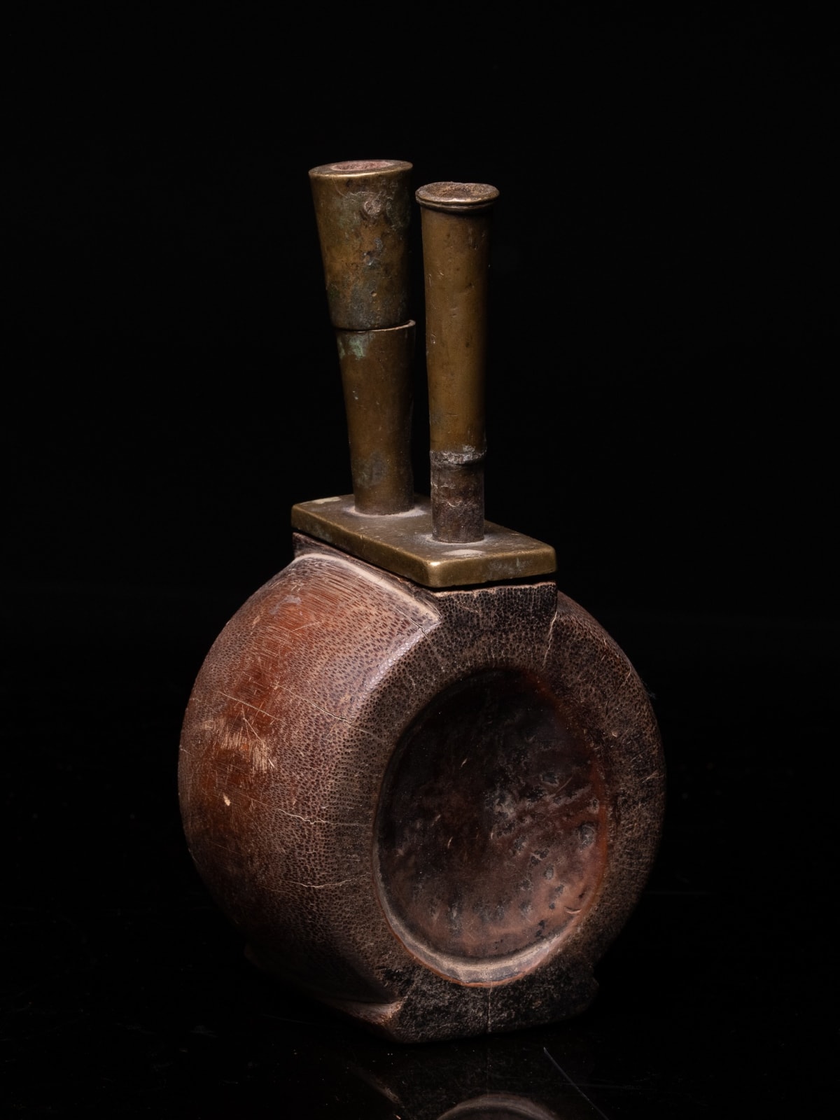 Old Bamboo Opium Pipe, with visible Knot of the Bamboo. The Mouthpiece and Furnace are in Bronze. The Piece comes from South China., 19th Century