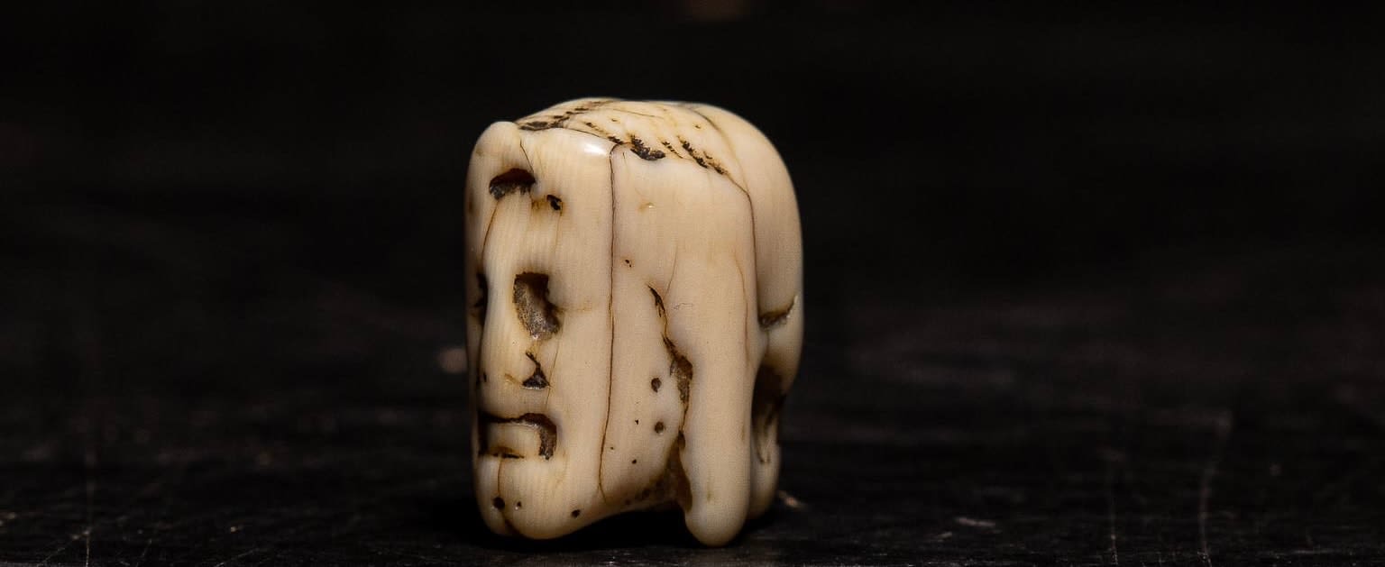 A Flemish Carved Ivory Janus faced Memento Mori Vanitas Paternoster Rosary Bead, Belgium, 17th Century