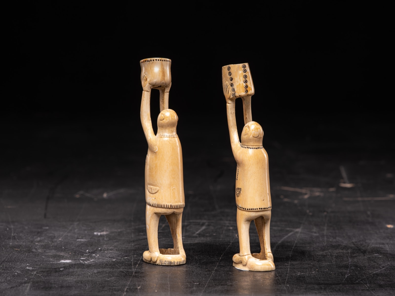 Pair of Inuit Male Statues carved in Caribou bone-probably Nunivak., 20th Century