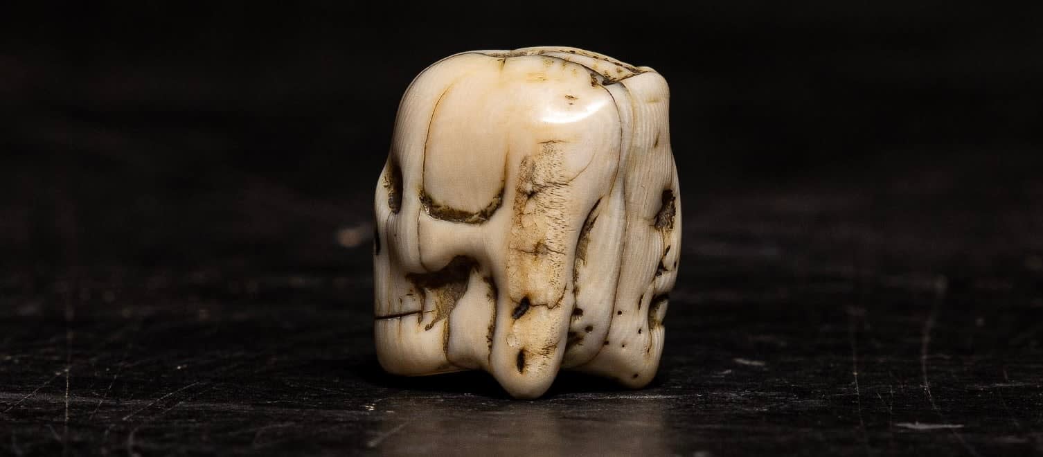 A Flemish Carved Ivory Janus faced Memento Mori Vanitas Paternoster Rosary Bead, Belgium, 17th Century