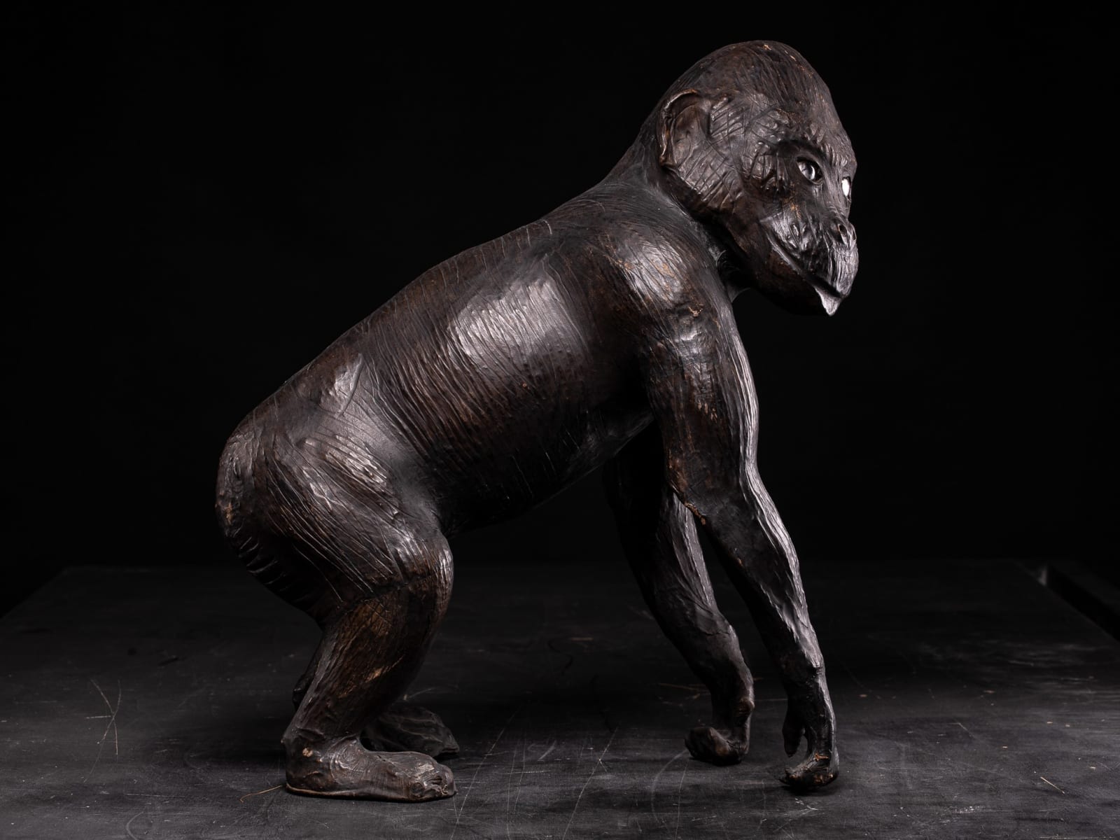 Leather walking Monkey Statue with Glass eyes, Unknown year