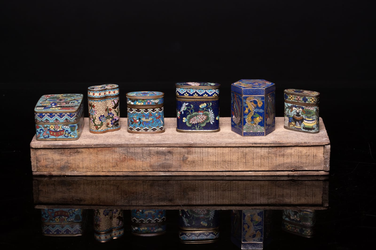 Collection of 6 Antique Chinese Opium Boxes enameled with decorative patterns, 19th Century