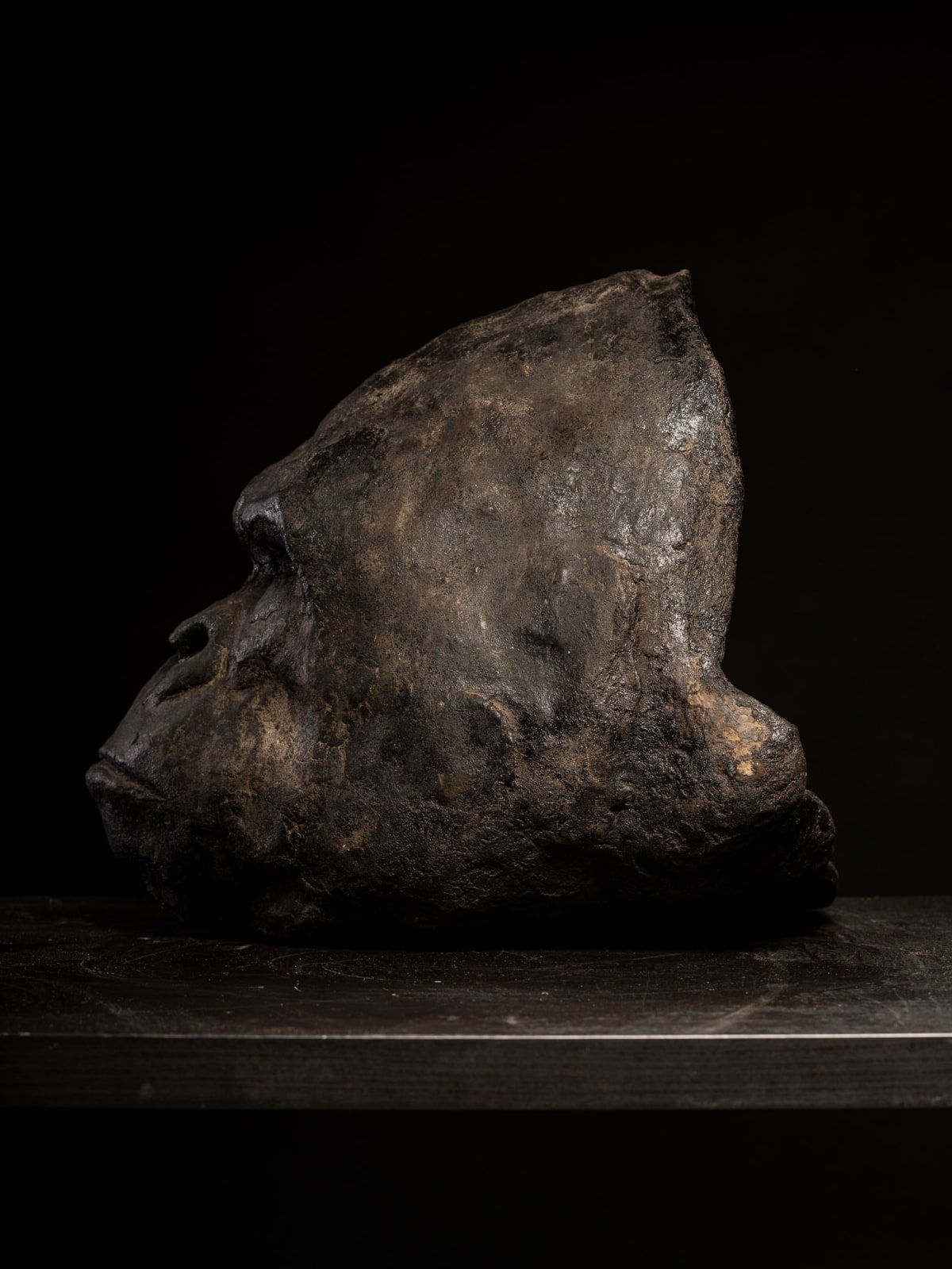 Sculpted Gorilla Head in burned Clay.,