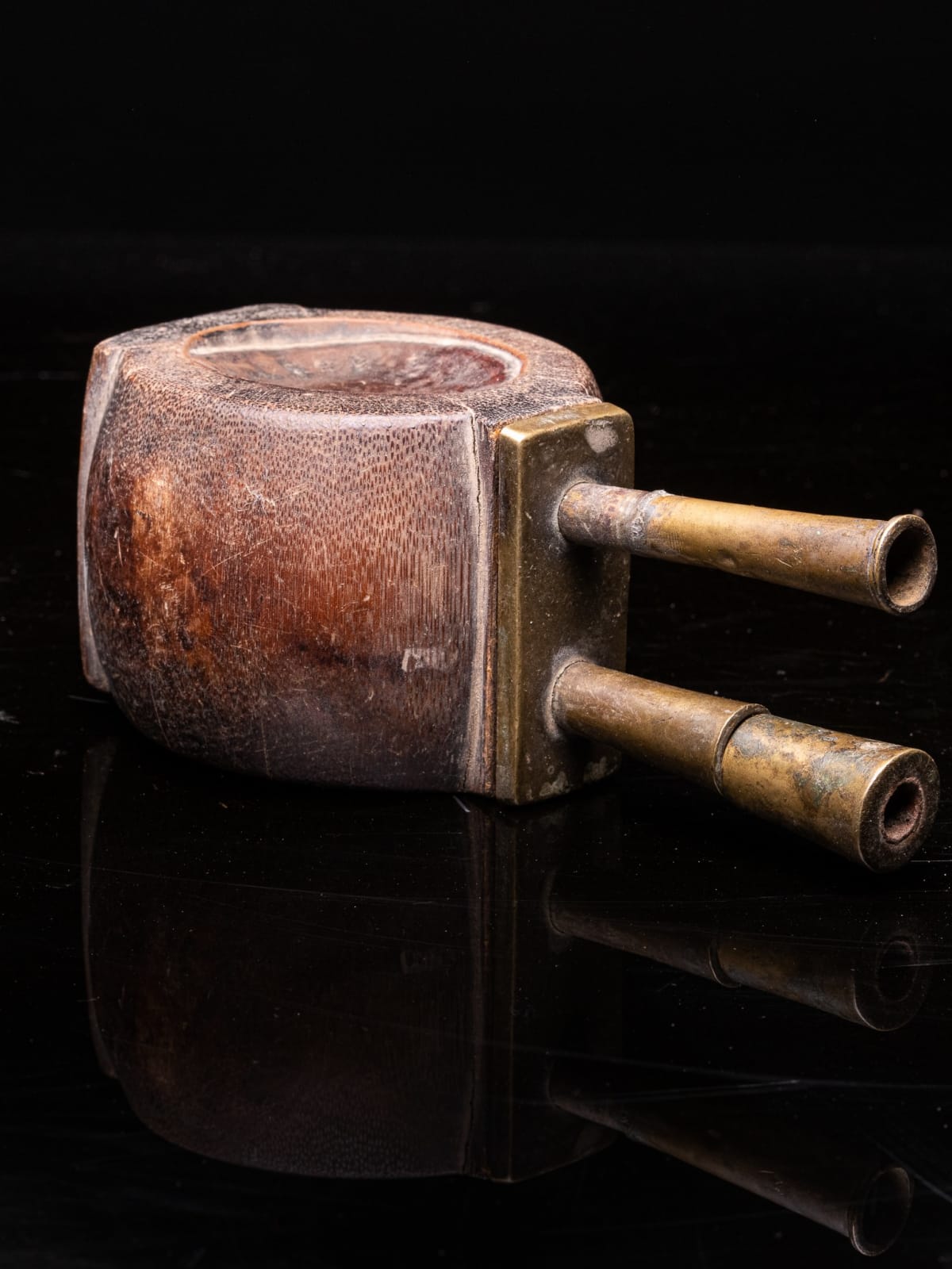 Old Bamboo Opium Pipe, with visible Knot of the Bamboo. The Mouthpiece and Furnace are in Bronze. The Piece comes from South China., 19th Century