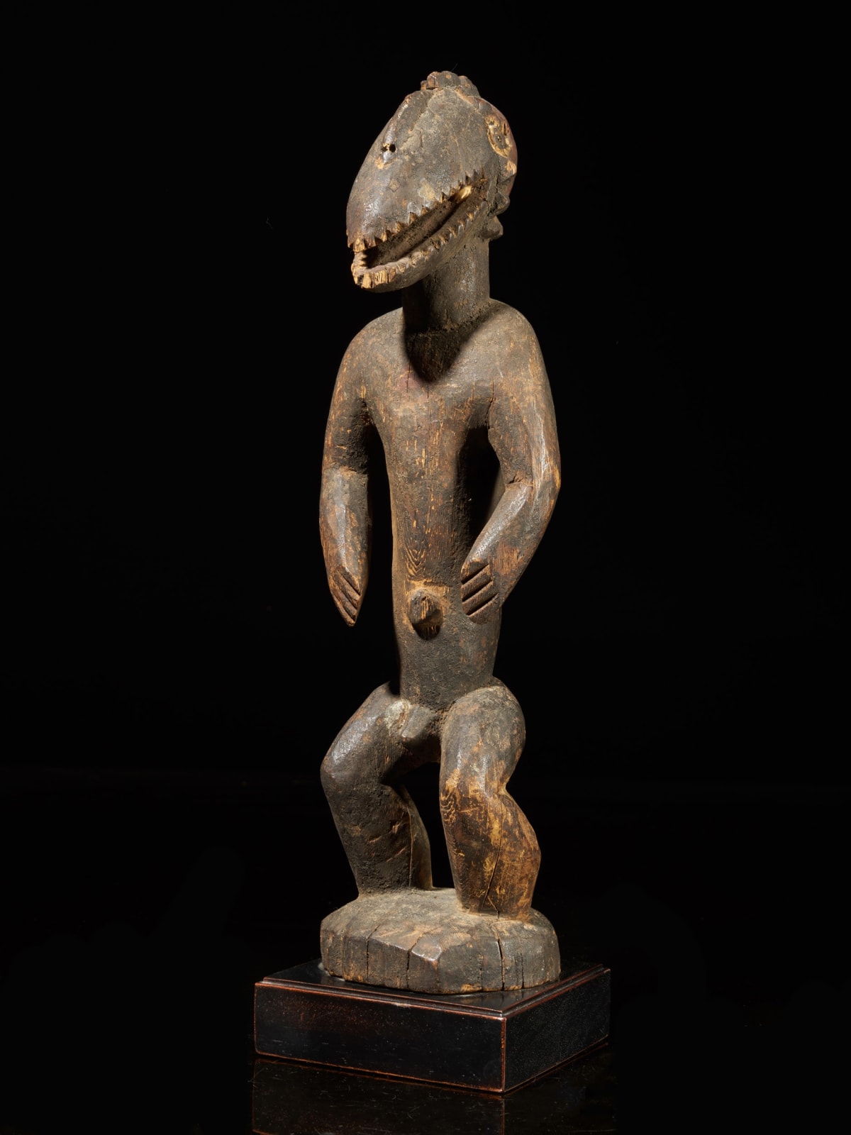 Montol-Goemai Wooden Statue wearing Gugwom-like mask., first half 20th C