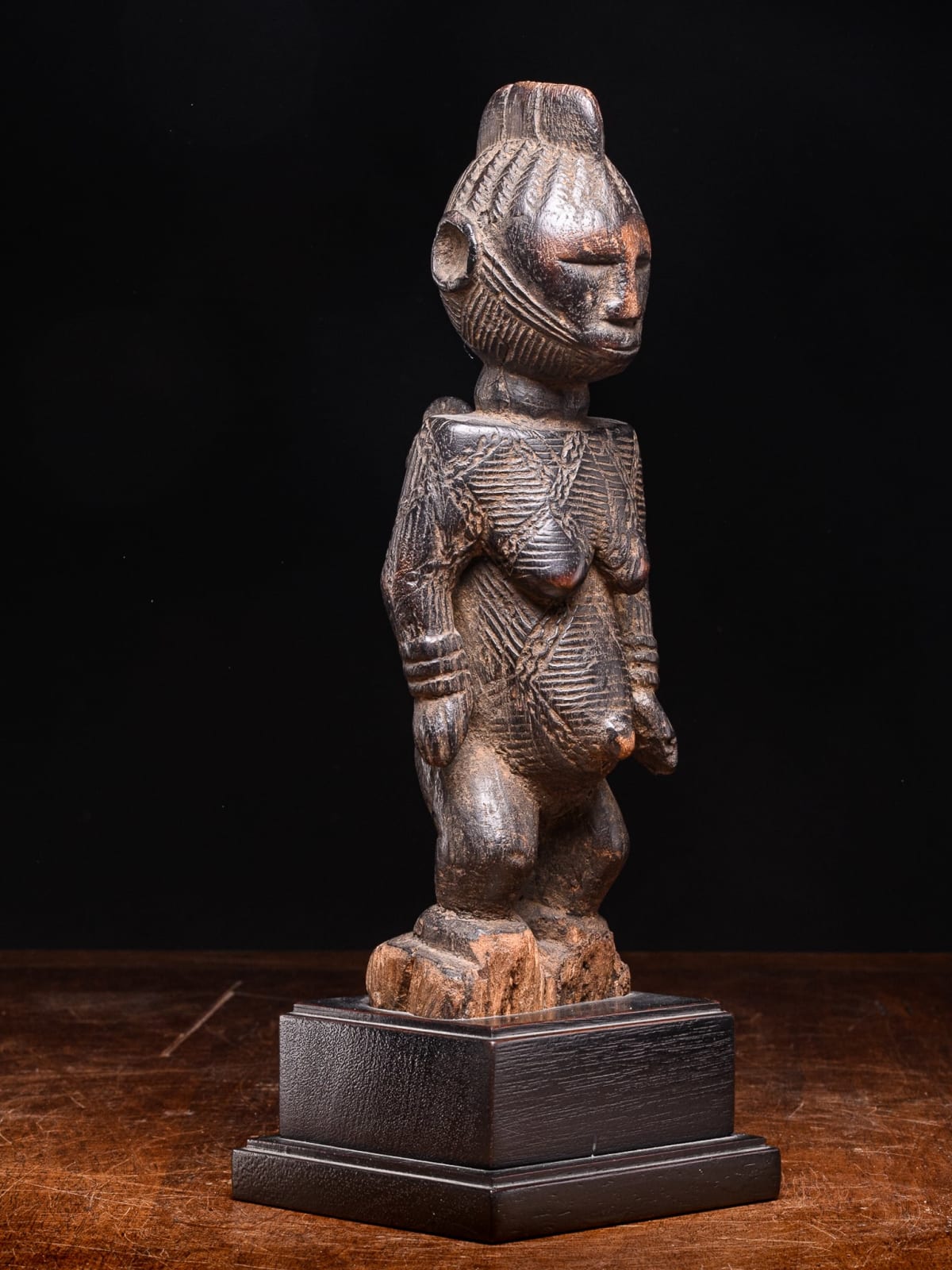 Igala scarified Maternity with infant on her back, Nigeria, 1st half 20th Century