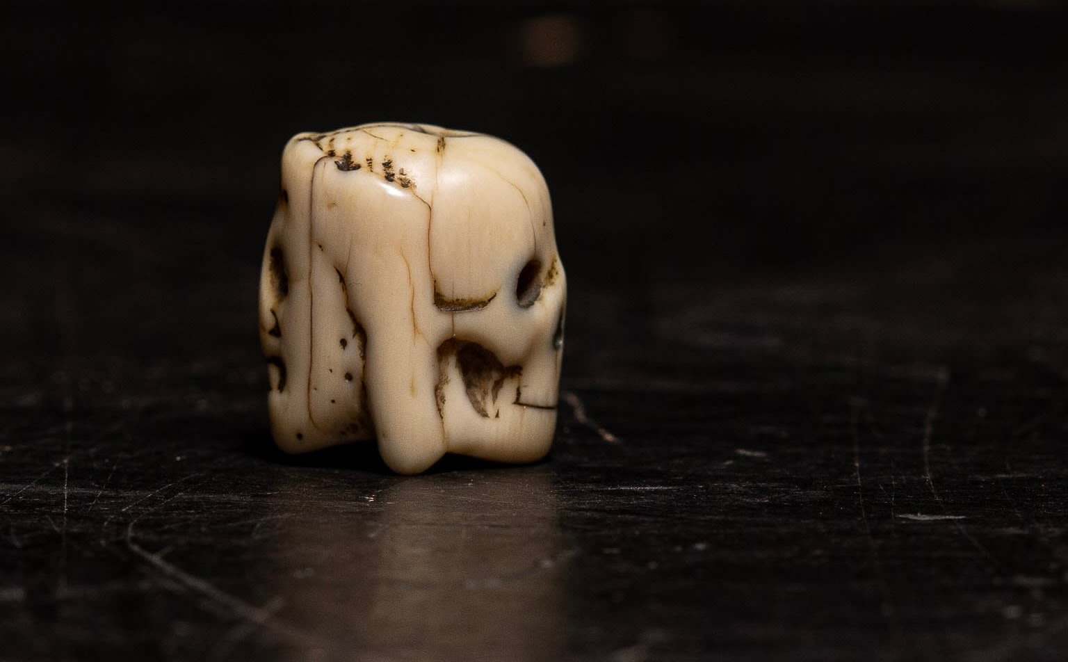A Flemish Carved Ivory Janus faced Memento Mori Vanitas Paternoster Rosary Bead, Belgium, 17th Century
