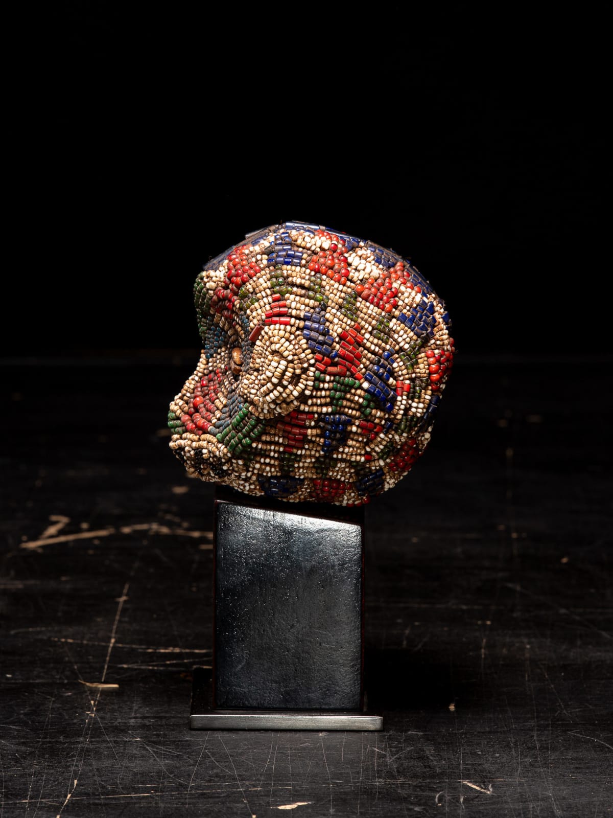 Bamileke Old Anthropomorphic Trophy Head embroidered with Murano White heart Glass Beads, Cameroon, 1st half 20th Century