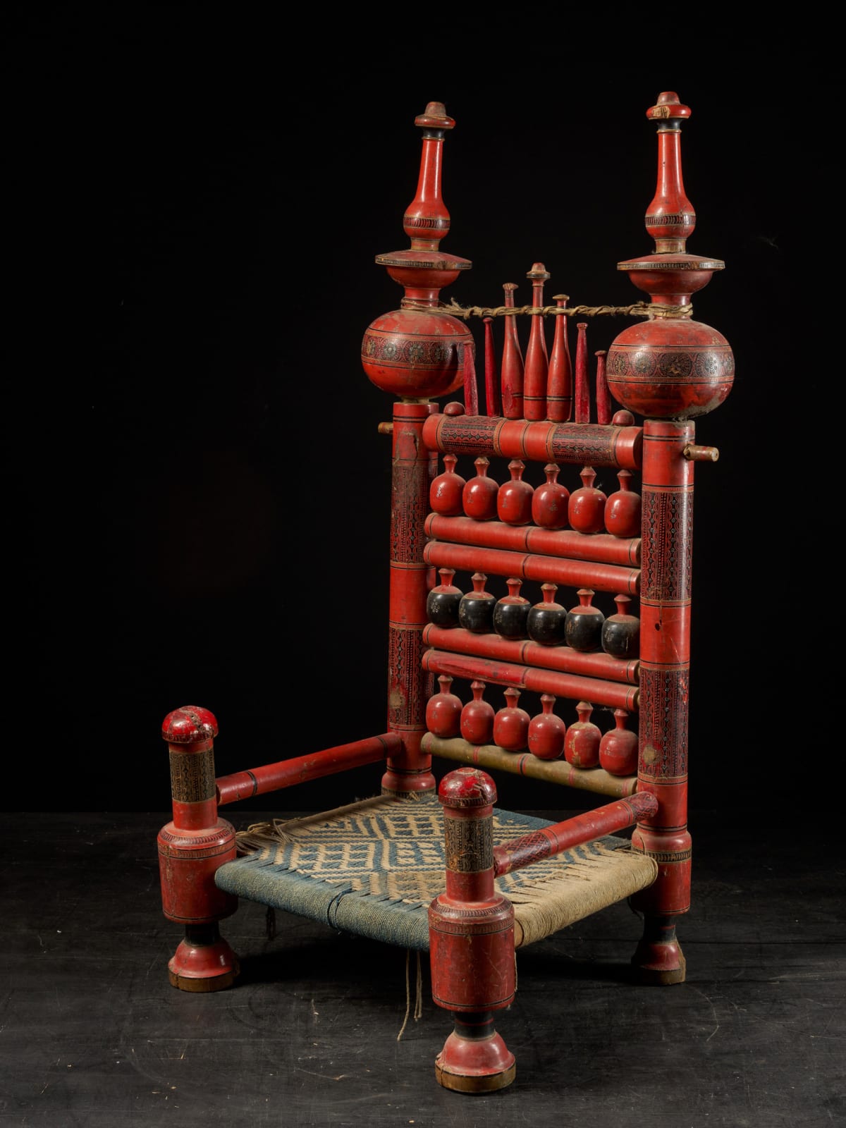 A pair of old Punjabi polychromed hand crafted wooden tribal Wedding Chairs, 20th C