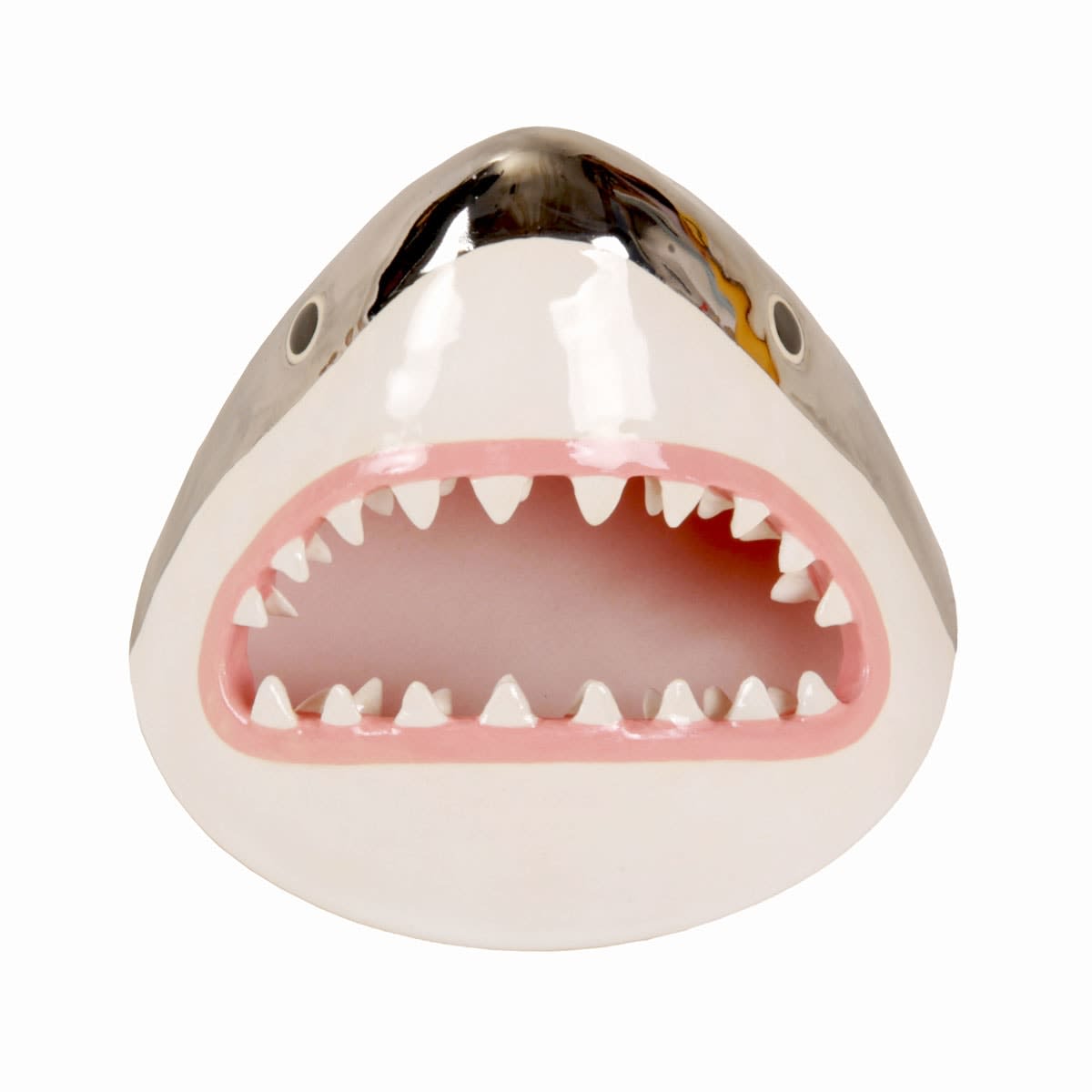 sculpture of a shark head with its teeth showing