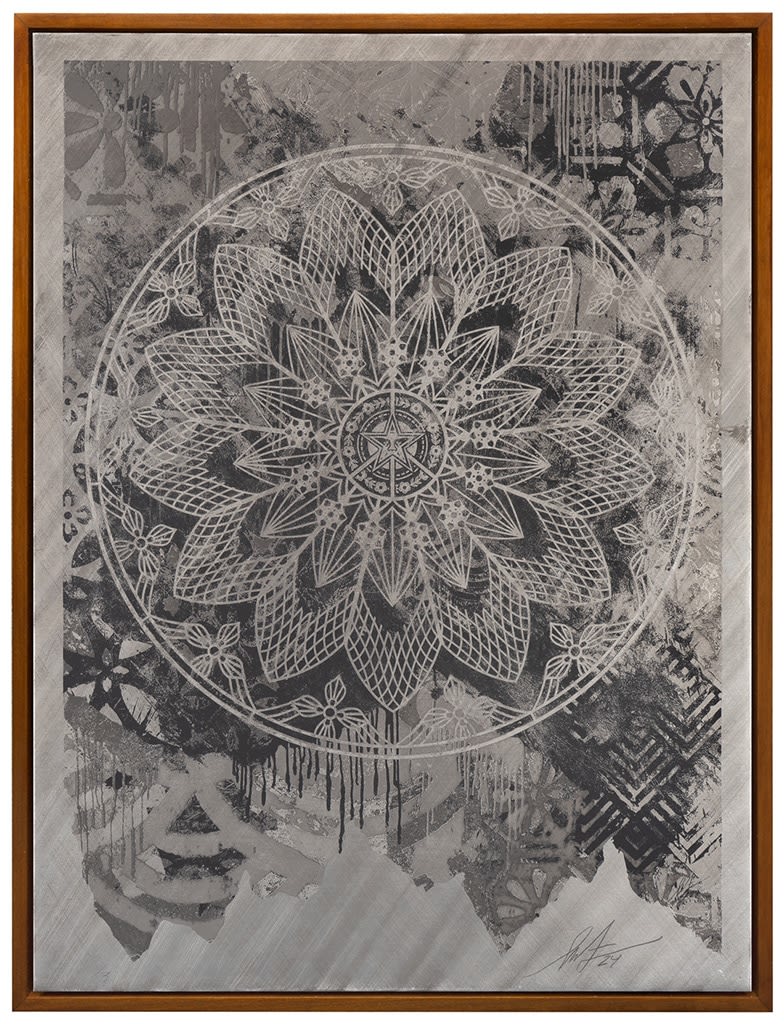 grey scale mandala image with a pattern behind it