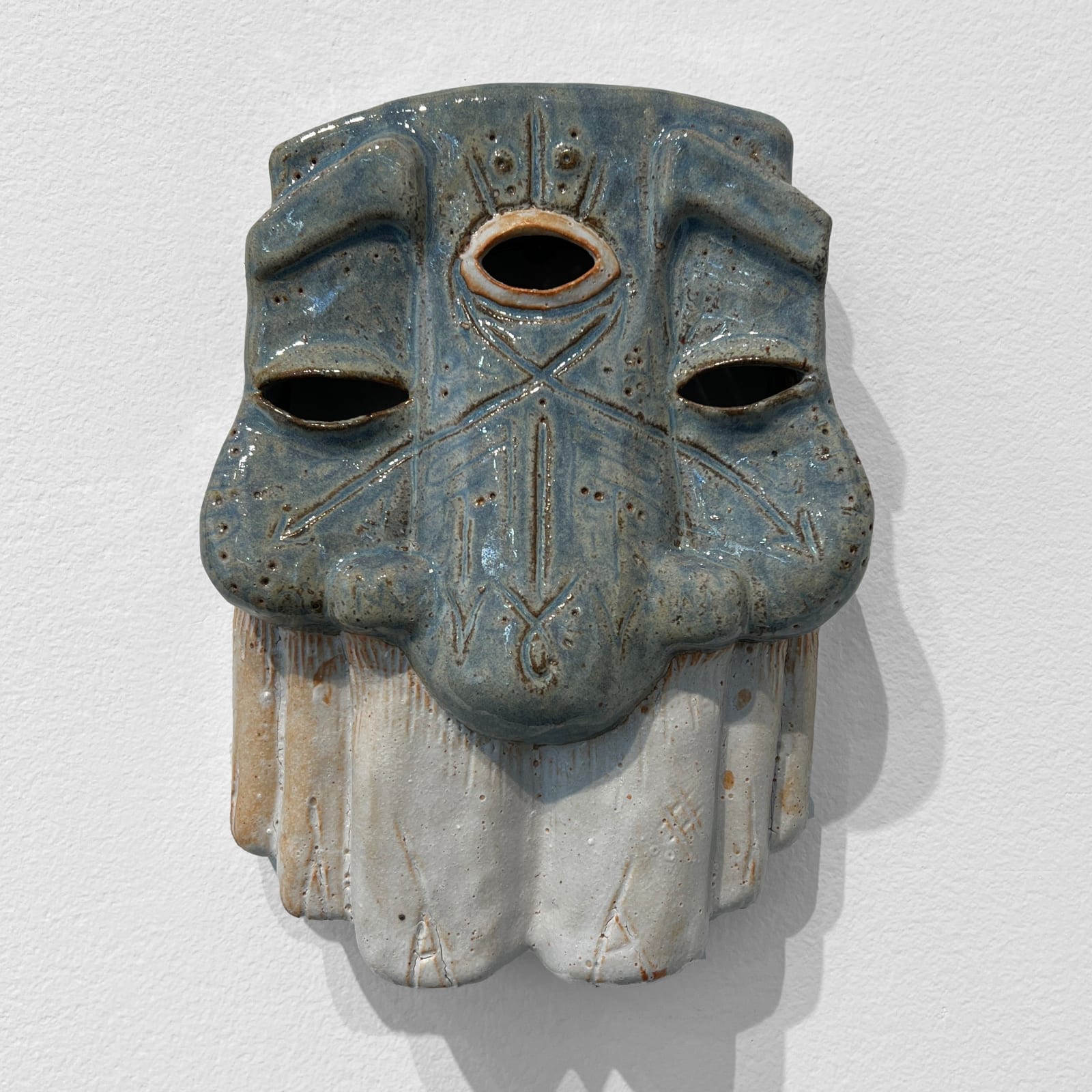 ceramic mask by artist GATS