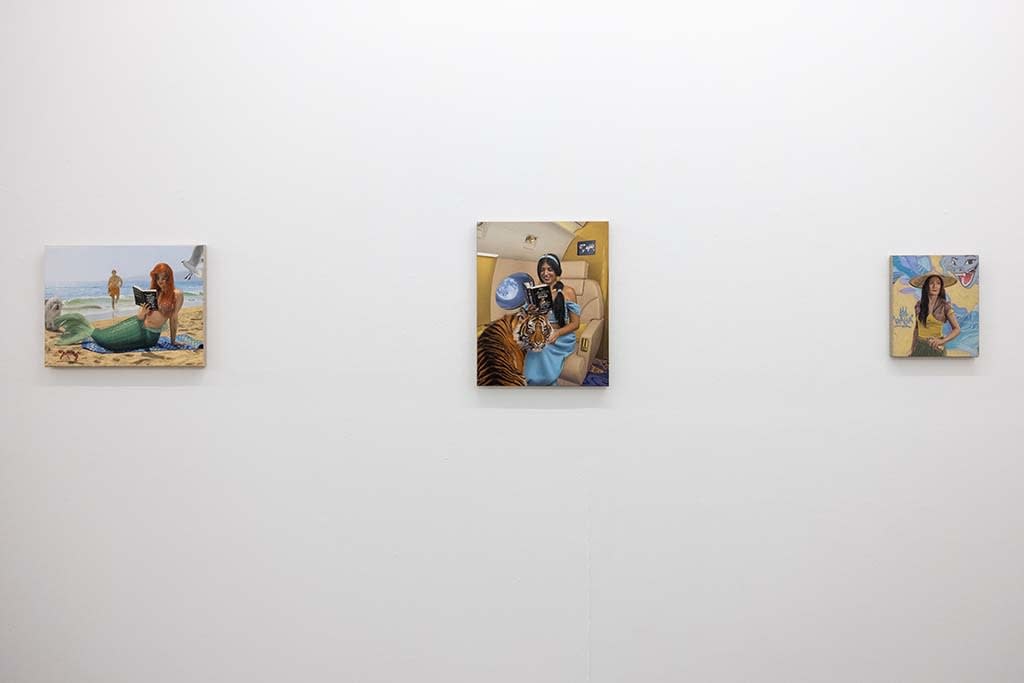 Photo of Matthew Grabelsky princess paintings hanging on white wall